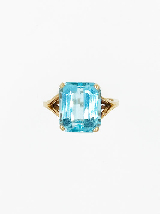 Elegant Emerald Step Cut Blue Topaz Ring in 14k Yellow Gold