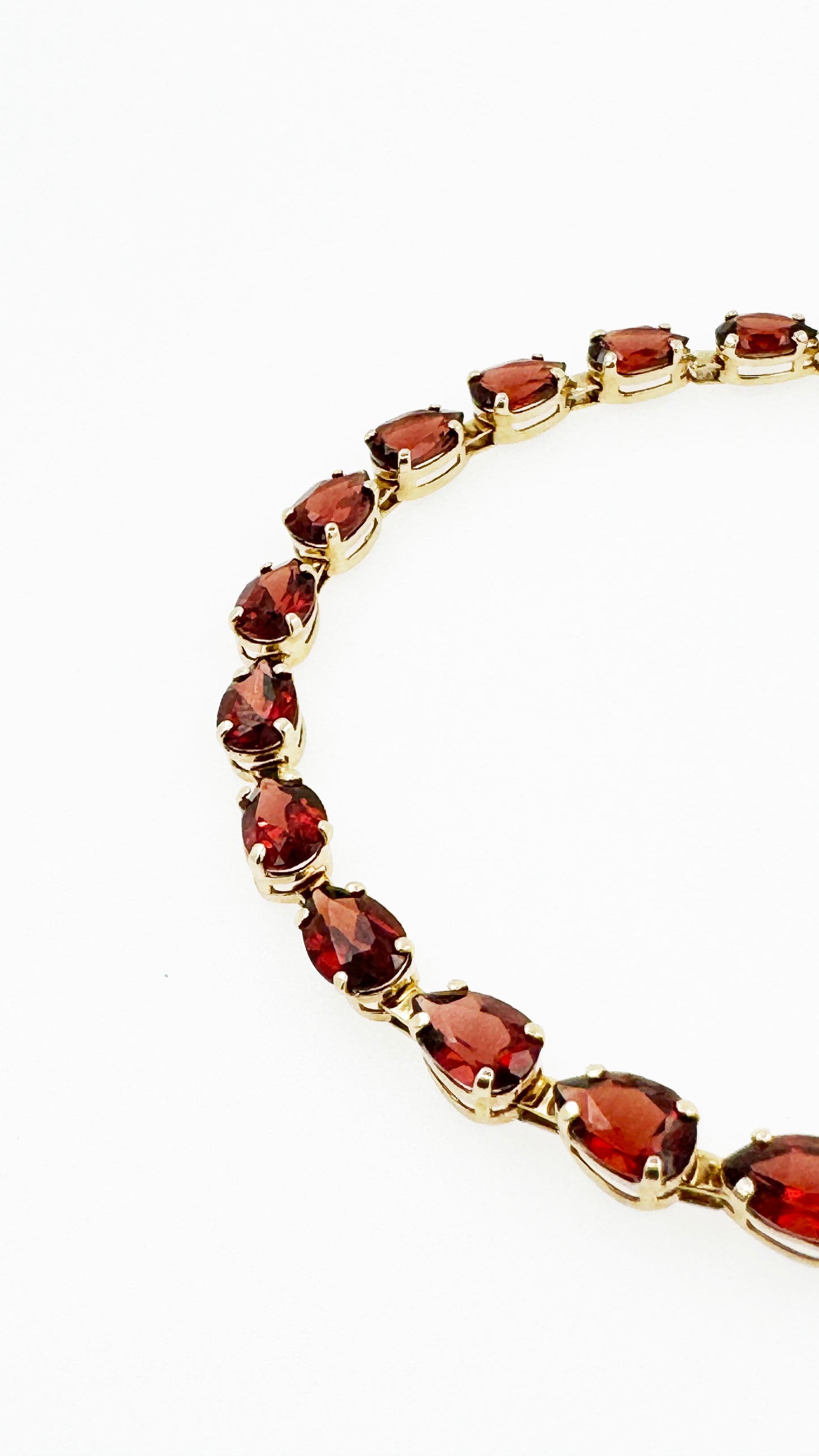 Pear Shaped Garnet Bracelet in 14k Yellow Gold