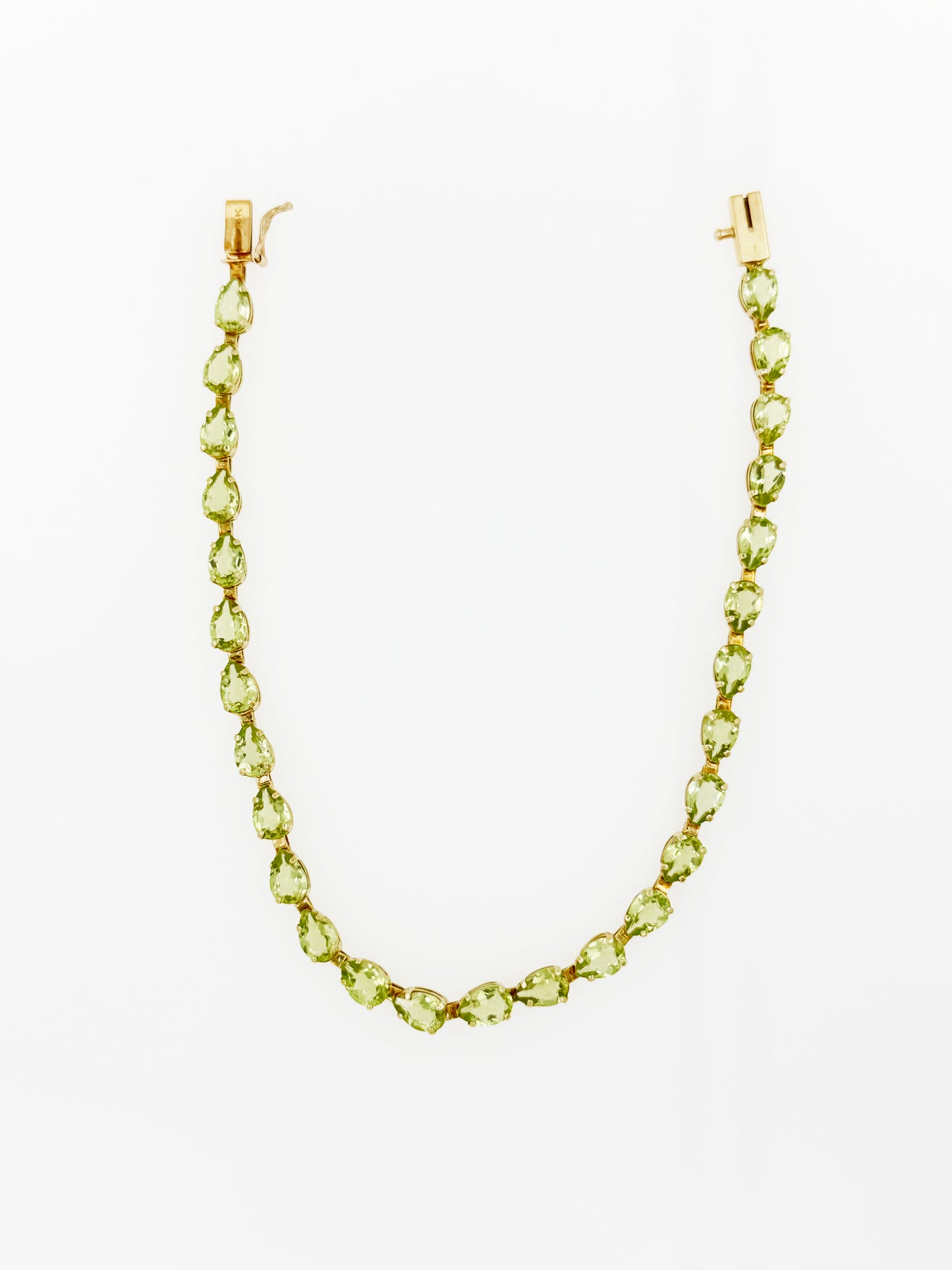 Pear Shaped Peridot Bracelet in 14k Yellow Gold