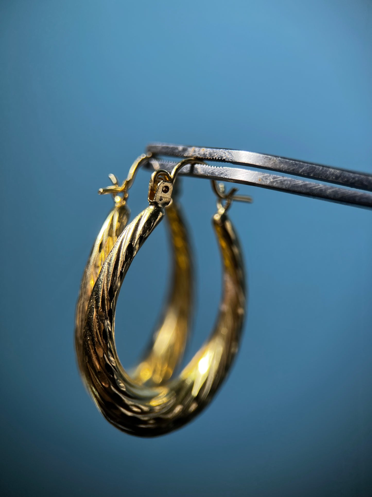 Diamond Cut Spiral Hoops in 14k Yellow Gold